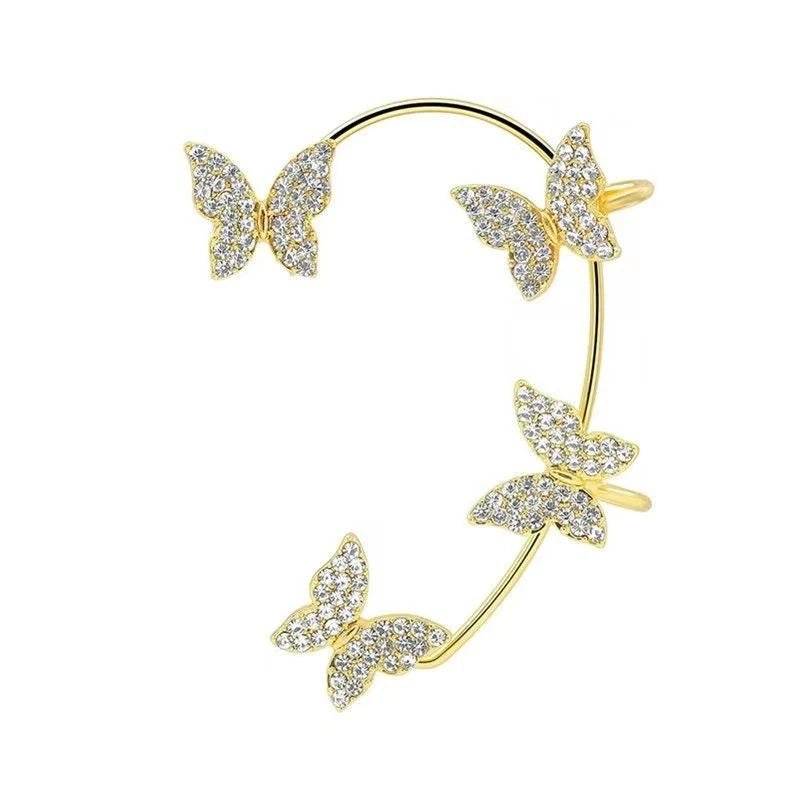 Gold-tone multi-butterfly ear wrap for the right ear