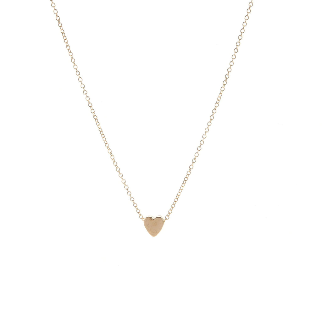 Gold-tone smooth heart pendant necklace on a white background