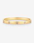 Gold-tone bangle bracelet with round clear stones on a white background (PAVOI reference image; supplier appearance awaits verification)