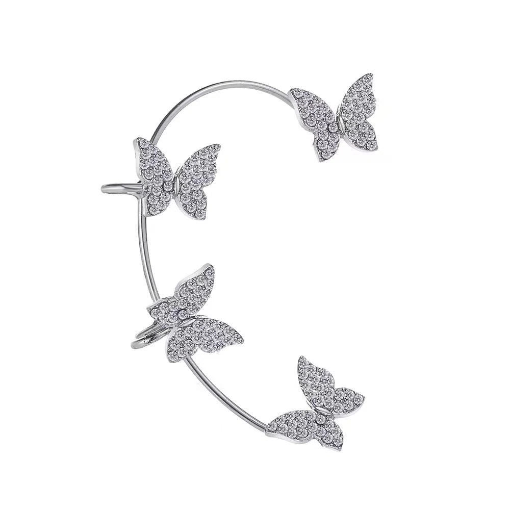 Silver-tone multi-butterfly ear wrap for the left ear