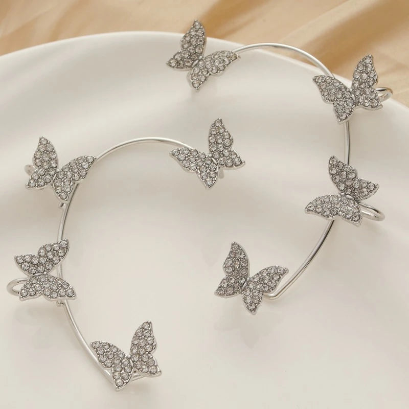Pair of silver-tone multi-butterfly ear wraps with clear stone details