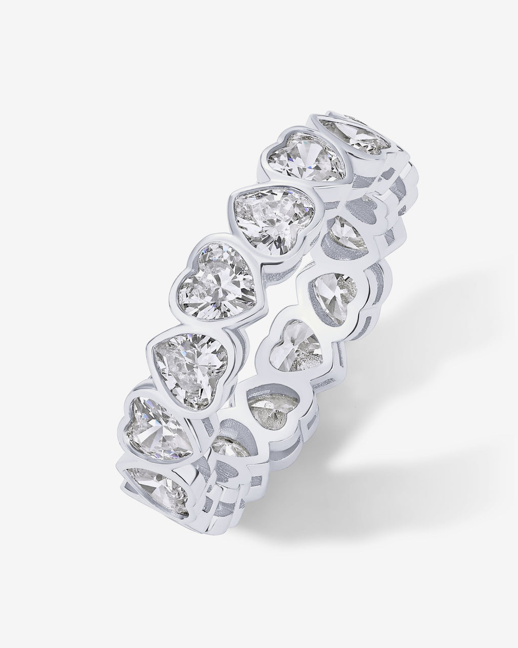 A silver-tone eternity ring with clear heart-shaped stones shown from the side at an angle (PAVOI reference image; supplier appearance awaits verification)