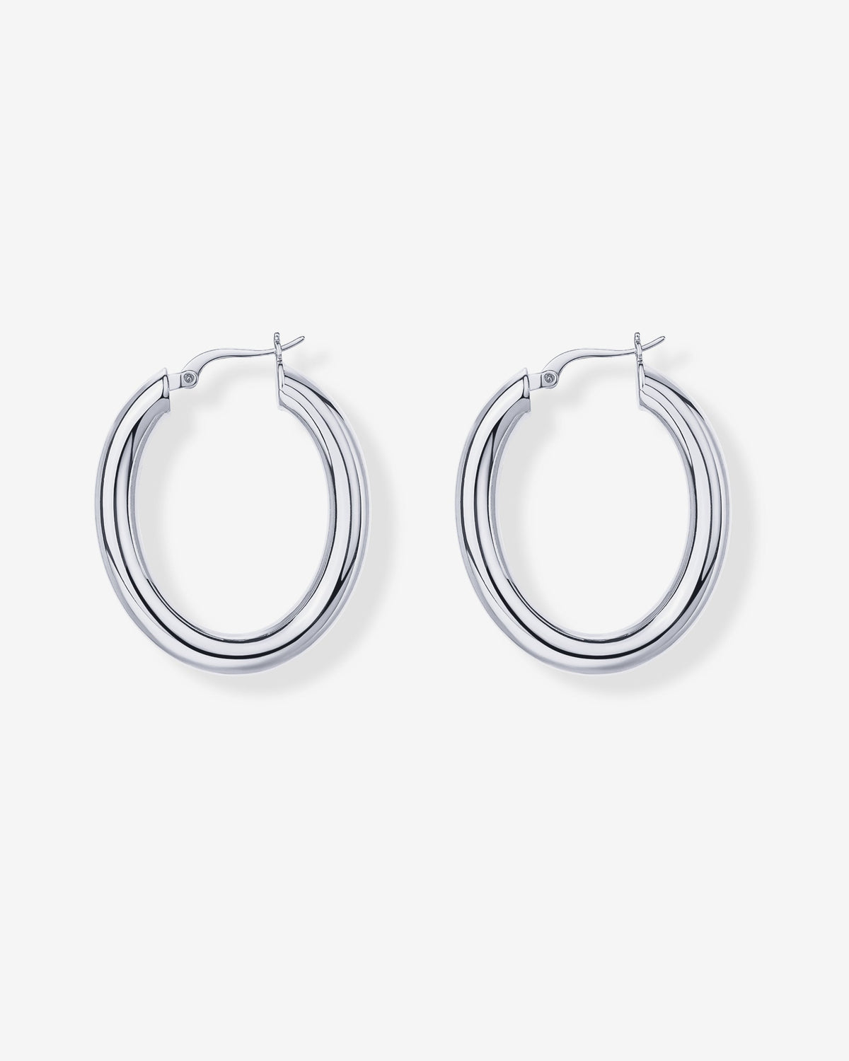 Silver-tone oval hoop earrings arranged with open clasps (PAVOI reference image; supplier appearance awaits verification)